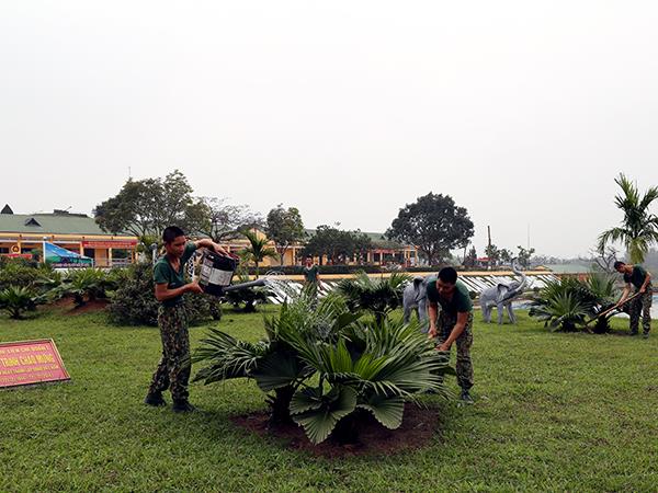 xay-dung-doanh-trai-chinh-quy-xanh-sach-dep